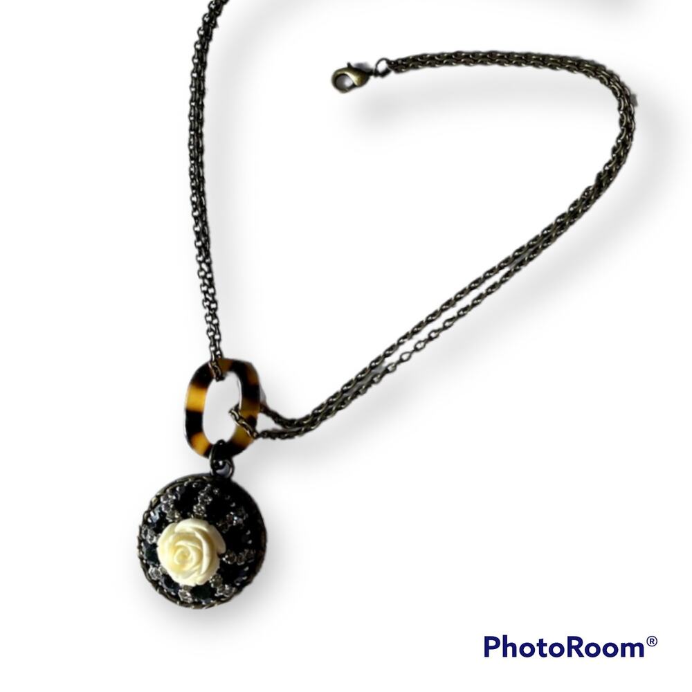 Brass tone tortoiseshell and carved rose necklace
